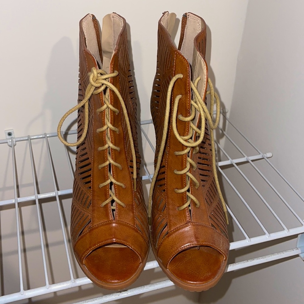 Brown lace up heels.